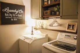 Add open shelves above your washer and dryer. Farmhouse Style Laundry Room Makeover For Less Than 100 The Frugal Homemaker