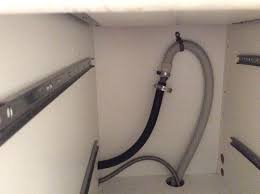 Set the dishwasher upright and route the drain hose out from underneath the unit; Miele Dishwasher Drain Hose Problem