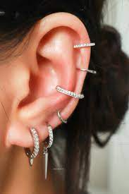 All The Way Around Cartilage Helix Ear Piercing Jewelry Ideas Www Impuria Com Ear Piercings Helix Earings Piercings Ear Piercings