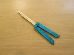 What is the best butterfly knife? How To Make A Butterfly Knife Using Pop Stick Easy Tutorials Youtube