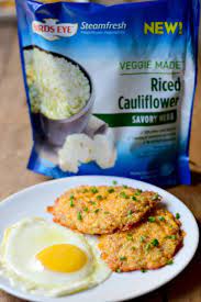 Low Carb Cheesy Cauliflower Hash Browns This Low Carb Cheesy Cauliflower Hash Brown Recipe Is Hashbrown Recipes Amazing Vegetarian Recipes Keto Frozen Meals