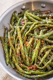 Lightly dredge each green bean in the flour, then dip it in the beaten eggs, and then evenly coat it in the panko mixture. Spicy Chinese Sichuan Green Beans Dinner Then Dessert