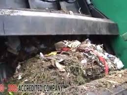 Image result for garbage truck compressor