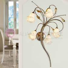 Collezione forgiatostile classico per un'eleganza tra passato e presenteapplique classico in ferro battuto a 1 luce con braccio elegantemente curvato. 1700 5a Lam Applique Stile Classico Rustico Country Ferro Battuto