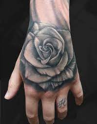 Black and red rose tattoos on both hands. Black And Grey Hand Tattoos Novocom Top