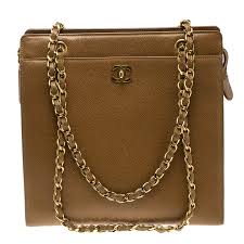Fendi bags bridge the gap between the casual and the luxurious, creating the perfect blend of practical and extraordinary with creations that elevate simple shapes with jacquard fabric, supple leather, and bold detailing. Chanel Camel Brown Caviar Leather Vintage Shoulder Tote Chanel Tlc
