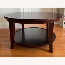 Find glass, wood and metal round accent tables in a variety of styles and finishes, perfect for any space. Pottery Barn Metropolitan Round Coffee Table Aptdeco