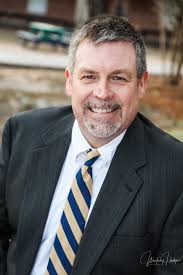 LCSD recognizes our school board members: Buddy Morris represents District  E and currently serves as the board president. He has been married to Karen  for 30 years. They have 3 children, Cody,