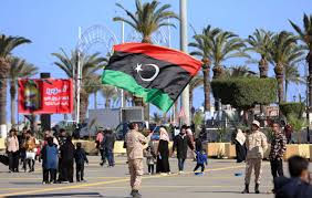 The flag was designed by omar faiek shennib and approved by king idris al senussi who comprised. Libyans Mark Uprising S 10th Anniversary As Menfi Visits Tripoli Daily Sabah
