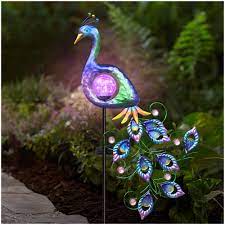 This themes focuses on solar power to create gadgets for the yard, and the world would be better place with more yard gadgets that use the sun among the many benefits of using solar power is the fact that it saves money while providing energy reliability, energy security, and energy independence. Amazon Com Denicmic Peacock Solar Pathway Lights Outdoor Solar Powered Garden Stake Decorative Yard Art Metal Glass Waterproof For Patio Landscape Lawn Pathway Courtyard 42 Inch Garden Outdoor