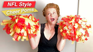 Shorter pom poms are attached with a metal clip in the middle. How To Make Cheerleader Tissue Pom Poms Youtube