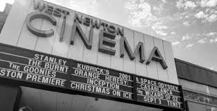 A theatre where people pay to watch films: West Newton Cinema