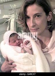 The abandoned three day old baby who has been named Sean by nurses at North  Middlesex Hospital is held by Sister Pat Godding today (Saturday). Baby  Sean was found in the Fairy