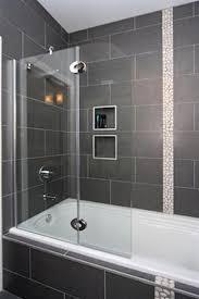 The framed glass walls have a sliding door that seals off. Small Bathroom Remodel Tub To Shower Novocom Top