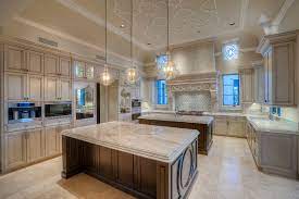 The matt lacquered cabinetry ensures a textured finish and furthers feeds into clean feel of the kitchen. Kitchen Islands Two Is Better Than One Fratantoni Luxury Estates
