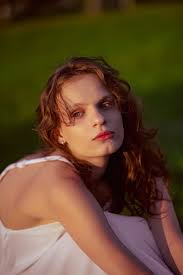 Woman with Brown Hair and Eyes Closed · Free Stock Photo