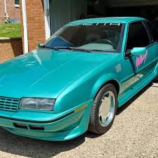 Image result for Bright Turquoise 1990 Colt