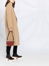 50% acrylic, 45% polyester, 5% wool, secondary fabric: Oversized Double Breasted Wool Coat Editorialist