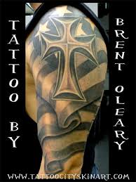 Cool tat ideas for displaying nationalist pride with american flag and. Cross N Flag Tattoo Design On Shoulder Flag Tattoo Tattoos Tattoos For Guys