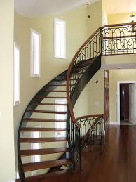They rest on a solid foundation and are attached to the deck with hangers. Our Work Custom Metal Fences Custom Rail Tech