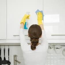 Begin to scrape off the sticky greasy gunk. How To Clean Kitchen Cabinet Doors