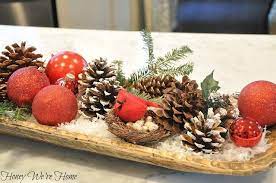 And equally simple is a pretty white dough bowl filled with faux pine greenery and pine cones on the kitchen countertop. Christmas Dough Bowl Honey We Re Home Dough Bowl Centerpiece Christmas Bowl Dough Bowl
