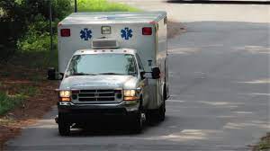 Zoom Close Up Of Ambulance Driving To Emergency Towards Camera Stock Footage Ambulance Driving Zoom Close Ambulance Recreational Vehicles Driving