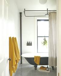 A White Vintage Style Bathroom With Black And Yellow Ochre Accents Mustard Yell Accents Ba Yellow Bathroom Decor Yellow Bathrooms Black And White Decor