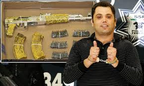 Became famous cause its ergonomics, simplicity, reliability and low price. Man With The Golden Gun Gold Plated Ak 47 Confiscated During Arrest Of Mexican Cartel Leader And He S Got Gold Bullets Too Daily Mail Online