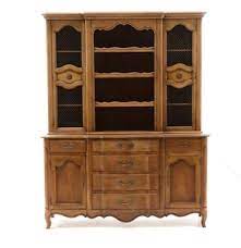 Buffet and sideboard are two terms used to describe the same unit, which is a long, low piece of furniture typically used for storage. Lot Art French Provincial Buffet With Hutch By Fancher