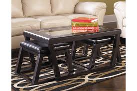 So there's no 'ouchies' from having stubbed your toe against a chair that's been our coffee table with 4 stools is ideal for young families. Kelton Coffee Table With Nesting Stools Ashley Furniture Homestore