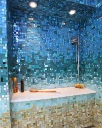 Take your birthday celebration under the sea with this adorable little mermaid cupcake topper/wrapper set! 13 Out Of This World Rooms That Take You Under The Sea Coastal Decor Ideas Interior Design Diy Shopping Glass Tile Bathroom Unique Bathroom Tropical Bathroom
