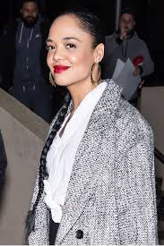 Tessa thompson's creed character won't just be a ringside cheerleader. Tessa Thompson S Waist Grazing Braid Gold Hoops And Red Lip Pay Homage To Sade Vogue