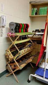 Save money on used ukuleles at guitar center. Homemade Ukulele Storage Rack Using A Clothes Drying Rack Fabric Pool Noodles Velcro Batting Music Room Storage Teaching Ukulele Elementary Music Classroom