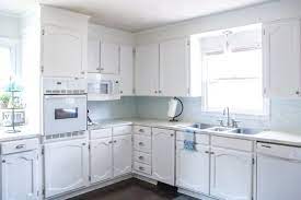 It's easy to hide floors and ugly blinds but kitchens and bathrooms are a different story. My Painted Cabinets Two Years Later The Good The Bad The Ugly Lovely Etc