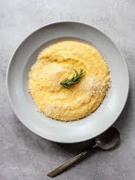 Remove from the heat and stir in the cheese. Creamy Polenta With Parmesan Cheese Familystyle Food