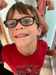 The baby is afraid ______ the dark. a) of b) from c) with