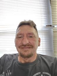 How to resolve an unpaid ticket issue from 2013 in Jackson, TN, to  reinstate a driver's license?