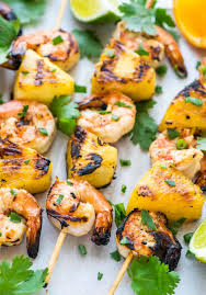 Thread about 5 shrimp onto the skewer, skewering each shrimp twice (through the tail and head ends) and spacing them evenly. Pineapple Shrimp Kabobs Grill Oven Or Stovetop