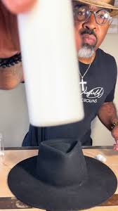 Black Guy Gives Man His Hat to Blend into Crown