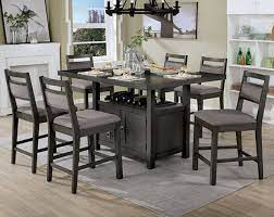 A true dining room combo! Vicky Storage Counter Height Dining Table With Wine Rack