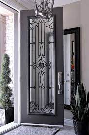 Affordable fence and gates has been building wrought iron gates in rough cut cedar planks at the bottom. Pin On D O O R