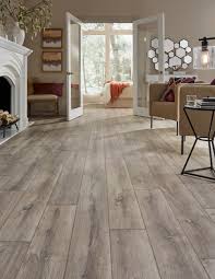 Laminate flooring on fireplace wall. 75 Beautiful Laminate Floor Living Room With A Wood Fireplace Surround Pictures Ideas July 2021 Houzz