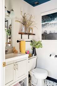 This cheerful artwork is cute and also practical for a kids' bathroom! 8 Ideas For What To Do With That Weird Space Above Your Toilet Apartment Therapy