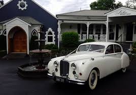 Where can i rent a car for a wedding? White Classic Jags Vic Wedding Car Association