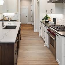 I am trying to figure out if the weight of /or 6 narrow feet will be. Select Surfaces Heritage Oak Spill Defense Laminate Flooring Sam S Club Laminate Flooring Flooring Installing Hardwood Floors