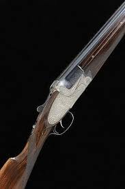 Double platinum double jaw set, articulated trigger, gas exhaust valves, selective automatic ejectors, fine etchings as illustrated by models. Sold Price Ugartechea A Scarce 12 Bore Model 153 Sidelock Ejector Over And Under Gun August 1 0116 5 00 Pm Bst