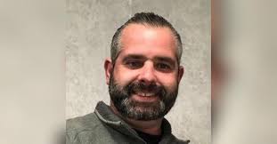 Mark J. Tully Obituary