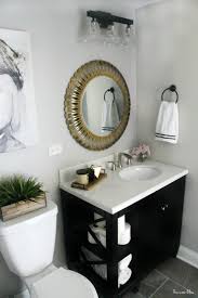 A dark wicker basket and a traditional rug add texture and softness to the whole, contrasting with the sometimes cold look of marble. How To Create A Neutral Glam Basement Bathroom This Is Our Bliss