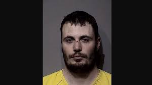 Suspect admits to firing gun toward Coeur d'Alene homes